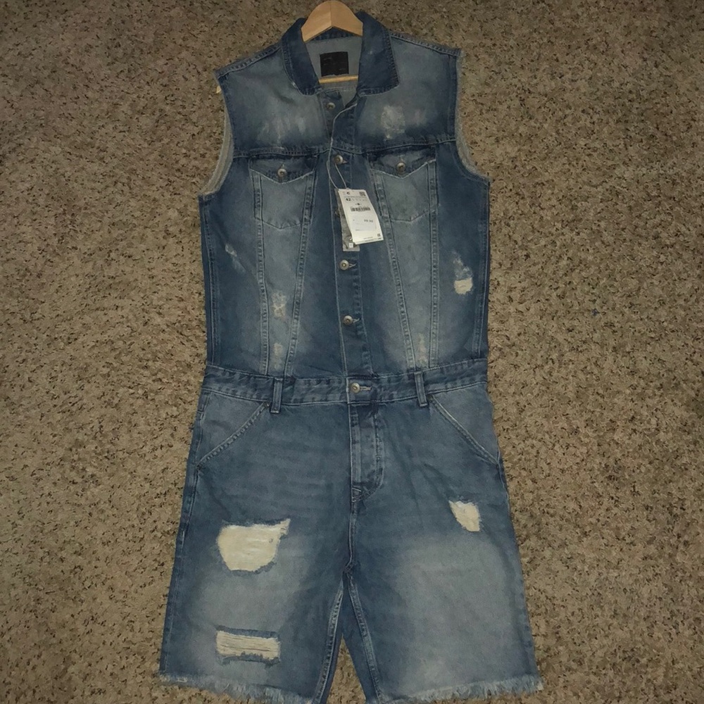 Denim sleeveless jumpsuit or romper.